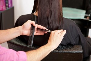 Woman getting haircut